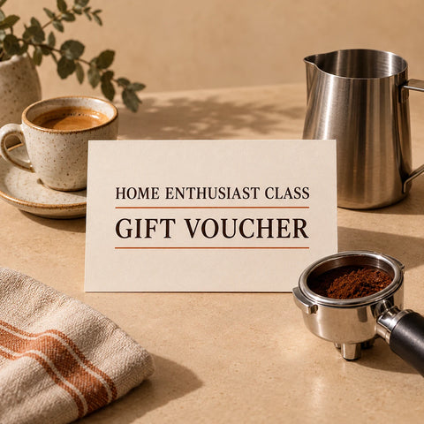 Home Enthusiast Class gift voucher with espresso cup, portafilter, and milk pitcher